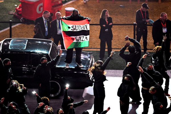 Super Bowl halftime performer charged for running on field with ‘Sudan and Free Gaza’ flag